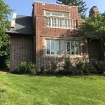 Ott-Construction-Montgomery-County-PA-Wynnewood-Exterior-Projects--custom-designed-in-law-suite-6-car-garage-flemish-brick-limestone-window-surrounds-capping-Marvin-windows-outdoor-terrace